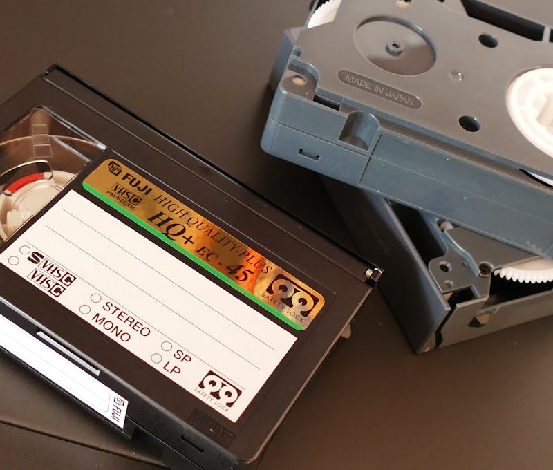Explore a collection of vintage VHS tapes that evoke nostalgia and the retro era of home entertainment.